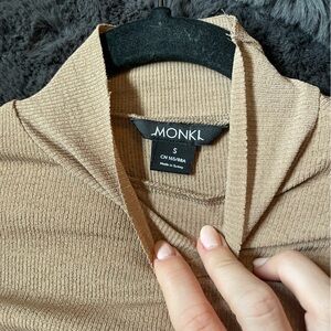 tan long sleeve turtle neck top